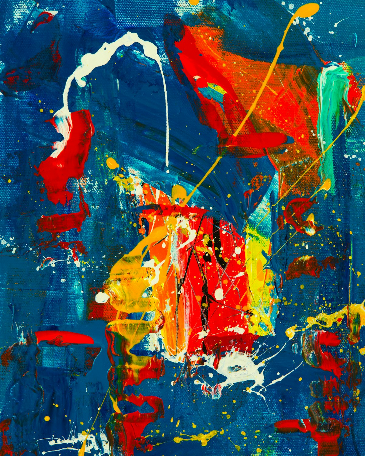 An abstract painting with red, yellow and blue shapes