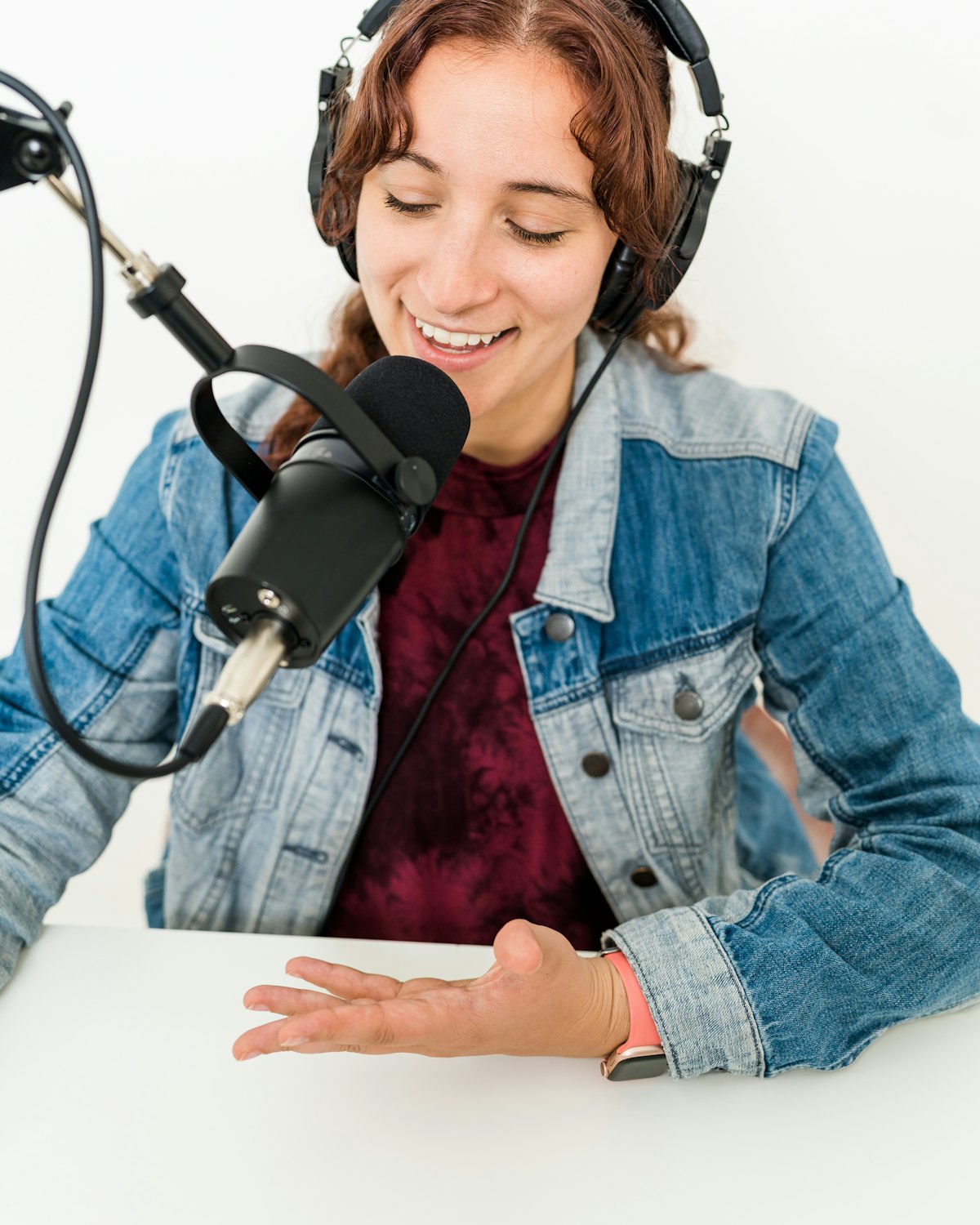 Maya recording an episode of Small Rooms