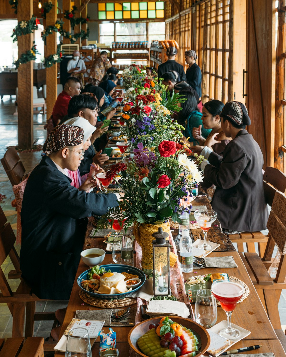 A small team working together at a long table