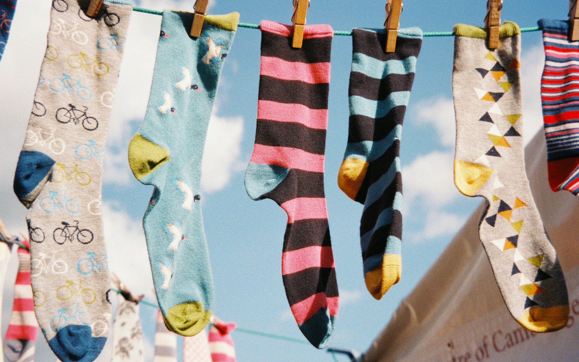 Colorful socks laid out in a grid