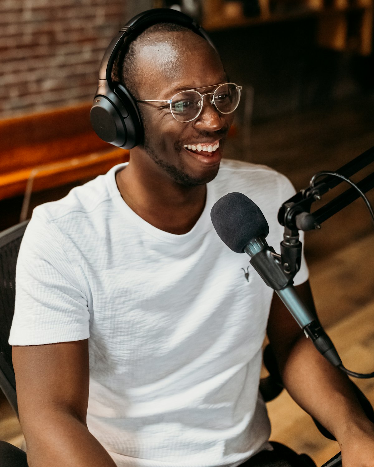 A guest laughing during an interview