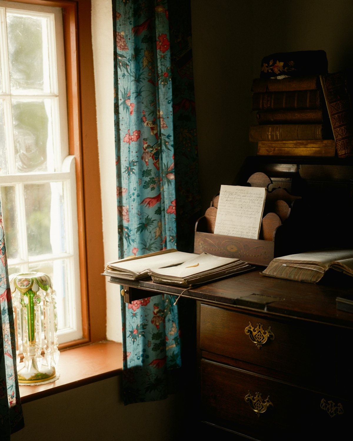 The book on a desk by a window