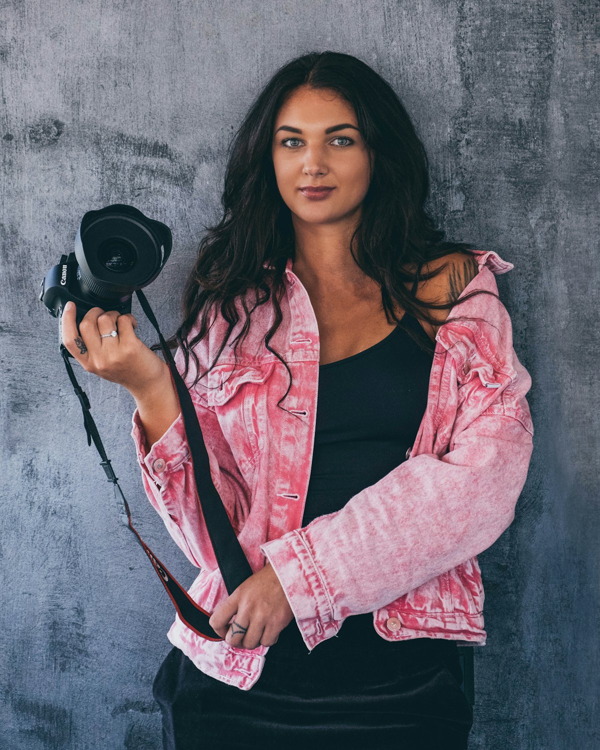 Clara Wren holding her camera