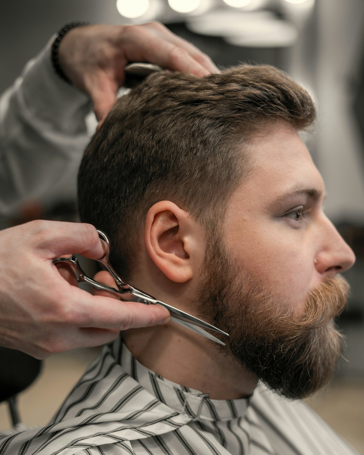 A beard trimmed and shaped with scissors